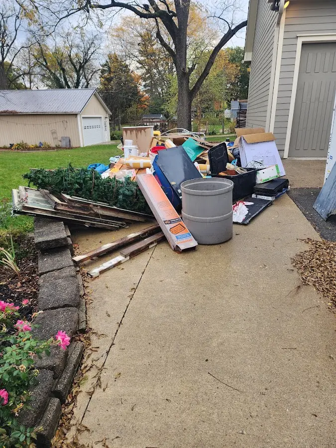 Dumpster being loaded with debris for 3 Yard Dumpster Rental in Union Vale